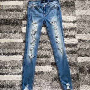 Distressed Low-Rise Super Skinny Jeans